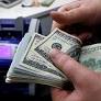 Na sexta-feira, o dólar à vista fechou em leve baixa de 0,12%, a 5,9182 reais -- a menor cotação desde 27 de novembro do ano passado.