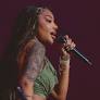 Ludmilla canta debaixo de chuva para 15 mil pessoas em Florianópolis em show marcado por sucessos. Cantora avalia turnê, estima faturamento e destaca ações...