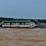 Rio Negro sobe 3,37 metros em janeiro, aliviando efeitos da estiagem em Manaus. Turismo e transporte mostram sinais de recuperação.