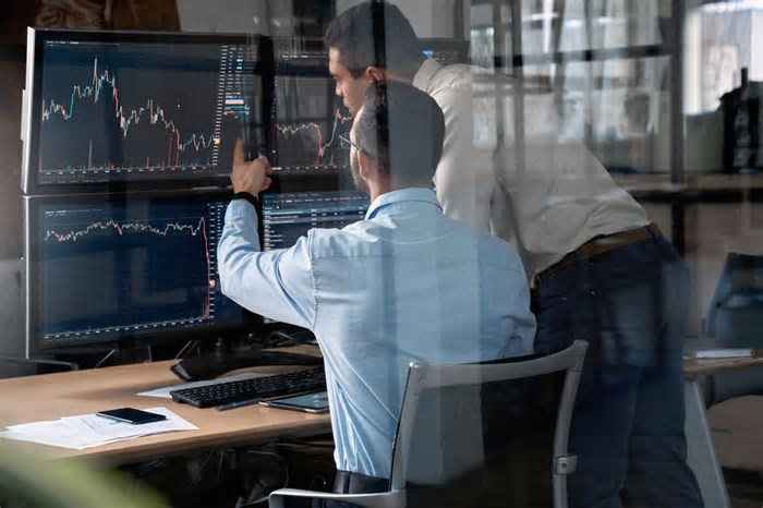 Gigantes financeiros adotam criptomoedas em seus portfólios