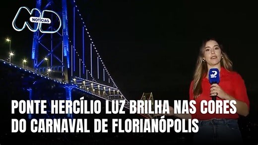 Durante o Carnaval, Ponte Hercílio Luz ganha iluminação nas cores das escolas de samba